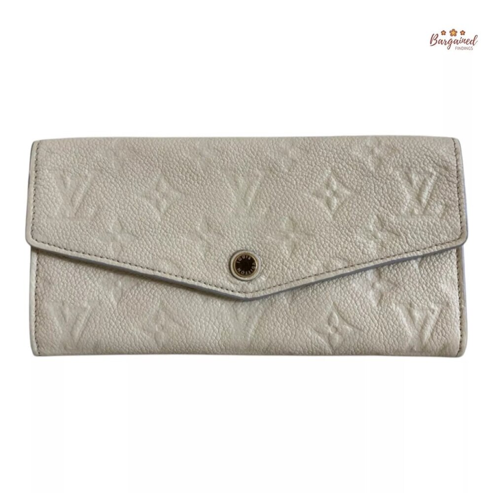 Authentic Louis Vuitton Cream Monogram Empreinte Curieuse Long Bifold Wallet